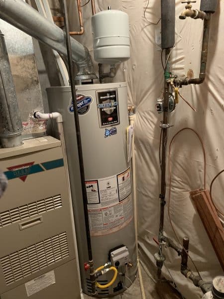 new Bradford White water heater with thermal expansion tank installed in residential home