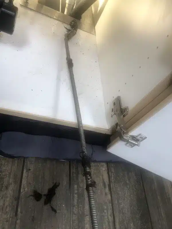 commercial floor drain line being cabled to clear clog commercial floor drain line being cabled to clear clog