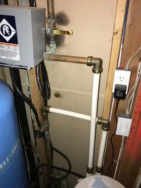 corroded copper pipe with leaking solder joint before plumbing repair