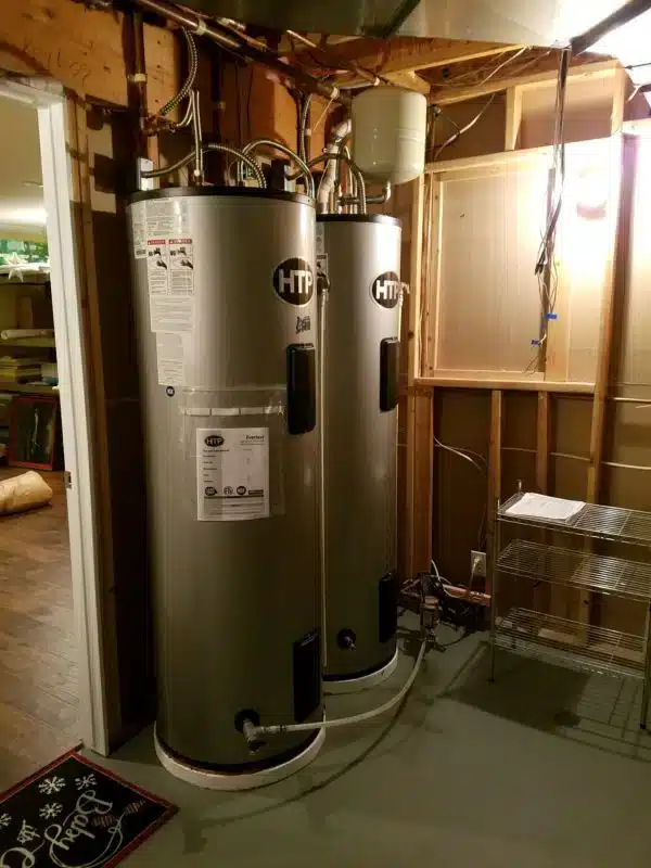 two 80 gallon htp water heaters installed side by side