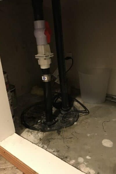 replacement ejector pump setup inside sump basin after installation