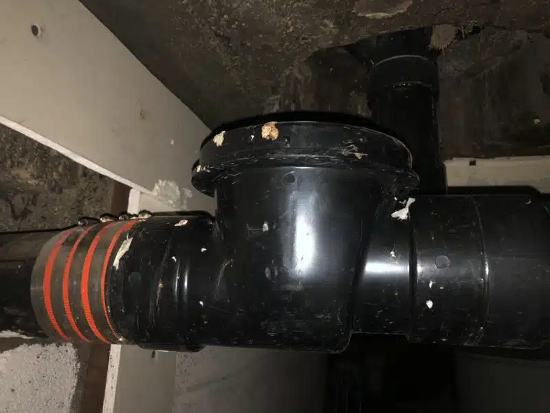 Exterior backwater valve access point for commercial sewer line protection