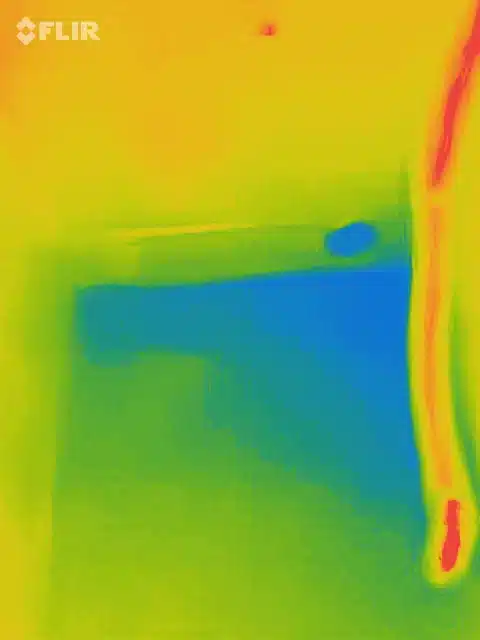 thermal imaging scan showing slab leak with blue temperature variation under concrete