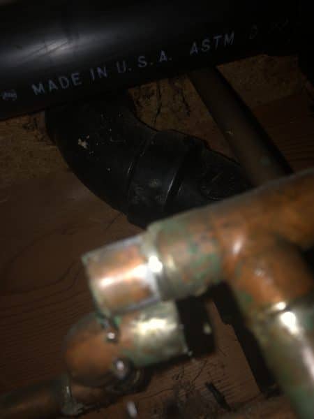 Repairing multiple copper pipe leaks caused by freeze damage after a home was left vacant during winter.