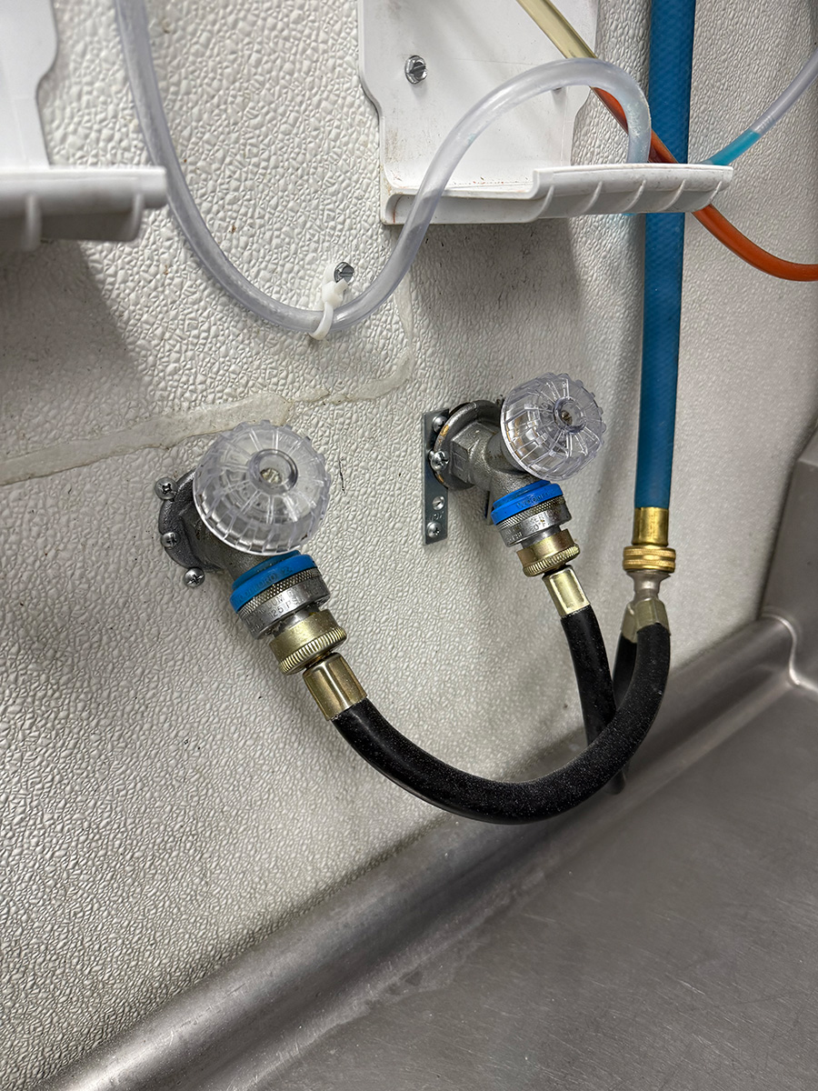 improper-commercial-hose-bib-installation Improperly installed separate hot and cold hose bibs inside restaurant kitchen