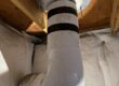 close view of roof drain pipe connection band inspected after leaking