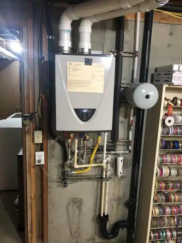 Takagi tankless water heater installed on residential plumbing system