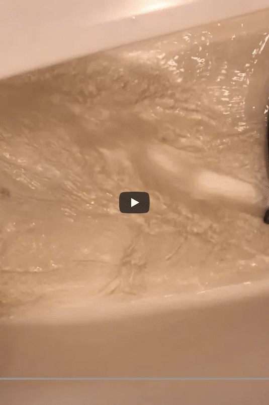 Heavy sediment draining from residential water heater in Hayden Idaho